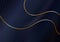 Abstract shiny gold wave curved lines pattern on dark blue background luxury style