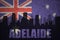 Abstract silhouette of the city with text Adelaide at the vintage australian flag