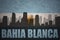 Abstract silhouette of the city with text Bahia Blanca at the vintage argentinean flag