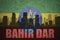 Abstract silhouette of the city with text Bahir Dar at the vintage ethiopian flag