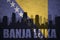 Abstract silhouette of the city with text Banja Luka at the vintage bosnian flag