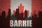 Abstract silhouette of the city with text Barrie at the vintage canadian flag
