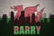 Abstract silhouette of the city with text Barry at the vintage wales flag