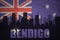 Abstract silhouette of the city with text Bendigo at the vintage australian flag
