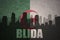 Abstract silhouette of the city with text Blida at the vintage algerian flag