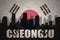 Abstract silhouette of the city with text Cheongju at the vintage south korea flag