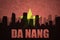 Abstract silhouette of the city with text Da Nang at the vintage vietnamese flag