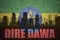 Abstract silhouette of the city with text Dire Dawa at the vintage ethiopian flag
