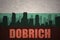 Abstract silhouette of the city with text Dobrich at the vintage bulgarian flag