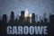 Abstract silhouette of the city with text Garoowe at the vintage somalia flag