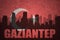 Abstract silhouette of the city with text Gaziantep at the vintage turkish flag