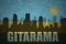 Abstract silhouette of the city with text Gitarama at the vintage rwandan flag
