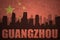 Abstract silhouette of the city with text Guangzhou at the vintage chinese flag