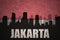 abstract silhouette of the city with text jakarta at the vintage indonesian flag