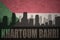 Abstract silhouette of the city with text Khartoum Bahri at the vintage sudanese flag