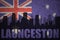 Abstract silhouette of the city with text Launceston at the vintage australian flag