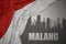 Abstract silhouette of the city with text Malang near waving national flag of indonesia on a gray background