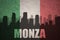 Abstract silhouette of the city with text Monza at the vintage italian flag