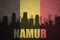 Abstract silhouette of the city with text Namur at the vintage belgian flag