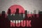 Abstract silhouette of the city with text Nuuk at the vintage greenland flag