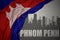 Abstract silhouette of the city with text Phnom Penh near waving national flag of cambodia on a gray background.3D illustration