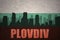 Abstract silhouette of the city with text Plovdiv at the vintage bulgarian flag