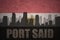 Abstract silhouette of the city with text Port Said at the vintage egyptian flag