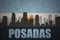 Abstract silhouette of the city with text Posadas at the vintage argentinean flag