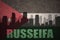 Abstract silhouette of the city with text Russeifa at the vintage jordan flag