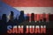 Abstract silhouette of the city with text San Juan at the vintage puerto rican flag