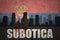 Abstract silhouette of the city with text Subotica at the vintage serbian flag