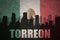 Abstract silhouette of the city with text Torreon at the vintage mexican flag