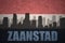 Abstract silhouette of the city with text Zaanstad at the vintage dutch flag