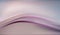 Abstract silk background with elegant waves draping. Lilac fuchsia. Elegant purple luxury soft pleats