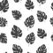 Abstract simple floral monstera seamless pattern with trendy hand drawn textures in black and white colors