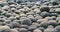 Abstract smooth round pebbles sea stone texture background