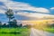 Abstract soft blurred and soft focus silhouette the sunset, paddy rice field, people driving the bicycle, the beautiful sky and cl