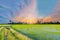 Abstract soft focus semi silhouette the bicycle,green paddy rice field with the beautiful sky and cloud in the evening in Thailand