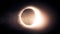 Abstract solar eclipse caused by a Lunar event with ring of fire on black background. Animated abstract view of a total