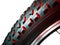 Abstract speed and power of cross mountain bike tire on white ba