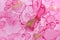 Abstract spring pink peony background. Pink and gold watercolor pattern.