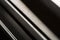 Abstract stack of aluminium profiles close up, industrial background macro