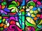 Abstract stained glass background of multicolored glass with floral and fruit ornaments