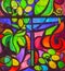 Abstract stained glass background of multicolored glass with floral and fruit ornaments, vertical frame