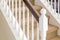 Abstract of Stair Railing and Carpeted Steps in House