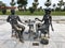 Abstract statues architectural of people drinking tea on Batumi seaside boulevard or Batumi Beach. Georgia, Batumi, April 17, 2019