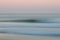 Abstract sunrise ocean background with blurred panning motion