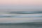 Abstract sunrise ocean background with blurred panning motion