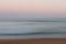 Abstract sunrise ocean background with blurred panning motion