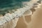 Abstract and surreal landscape view of sand dunes and blue water